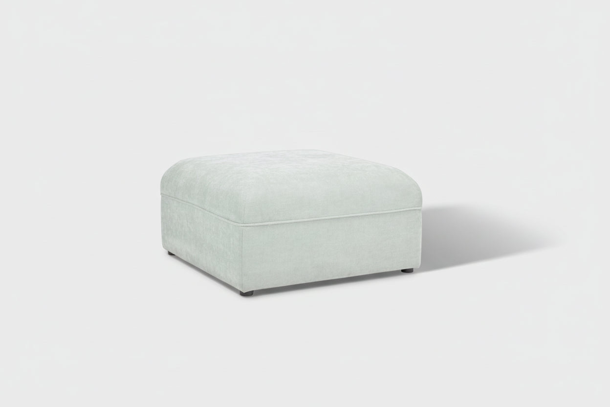 Light gray ottoman on a white background