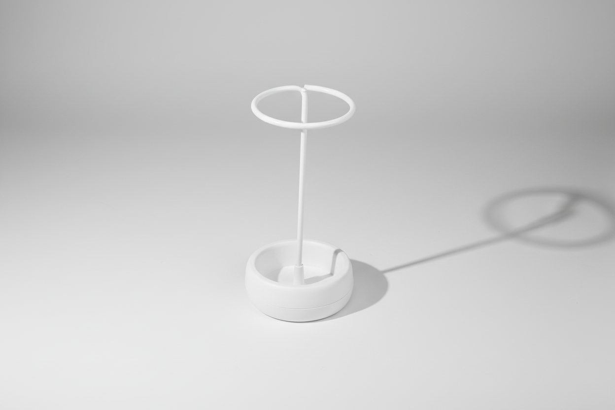 White stand with circular base on a white background