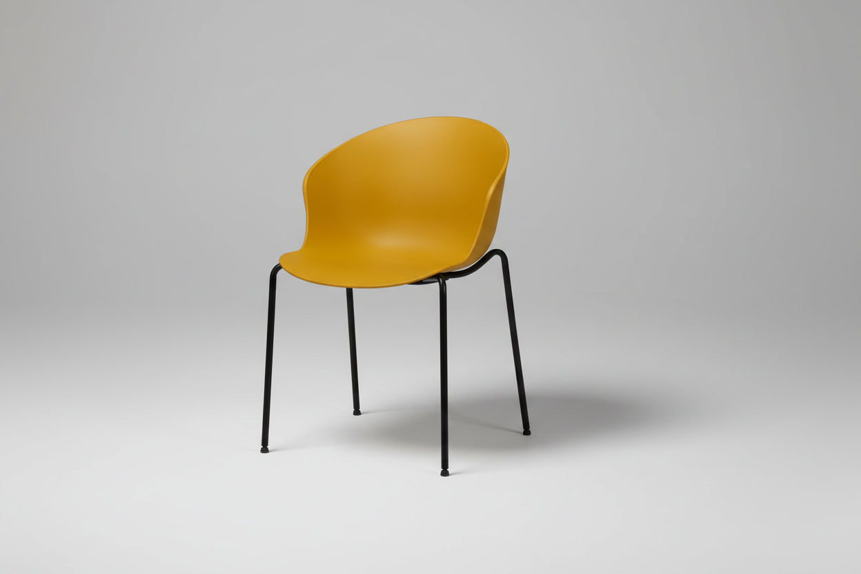 Yellow chair with black legs on a white background