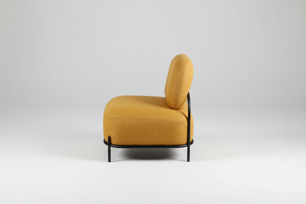 Mustard yellow chair with black metal frame on a white background