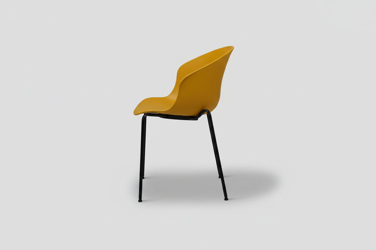 Yellow chair with black legs on a white background