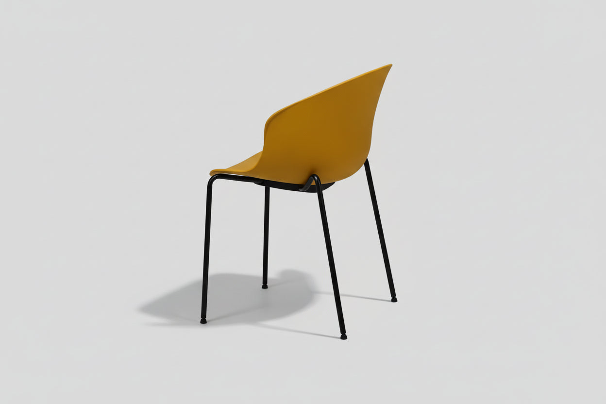 Yellow chair with black legs on a white background