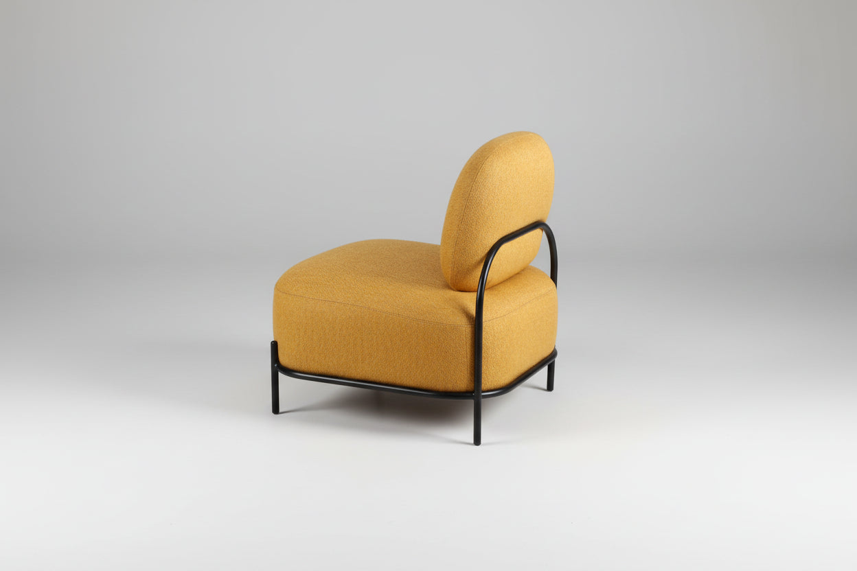Yellow armchair with black metal frame on a white background