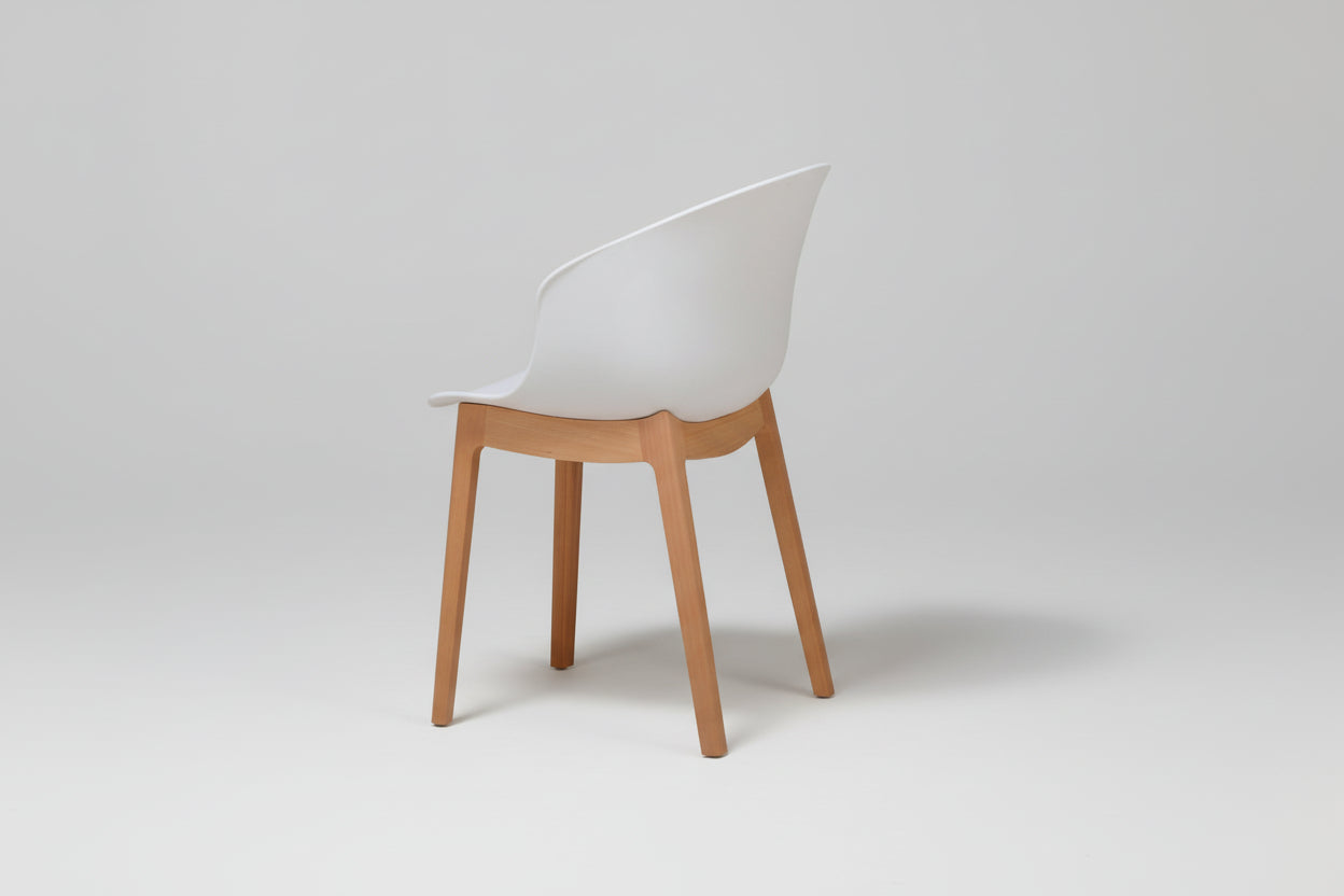 Chair with white backrest and wooden legs on a white background