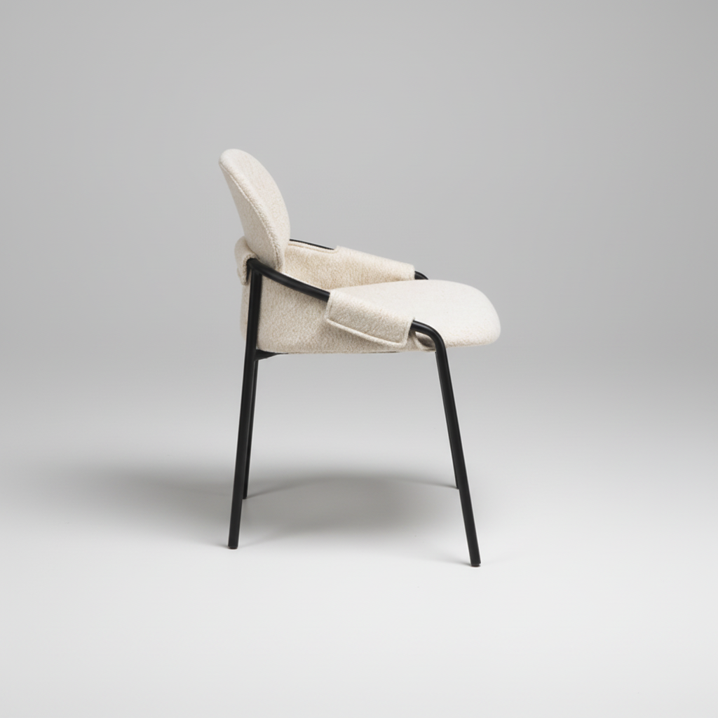 Modern chair with black legs and white cushioned seat on a white background
